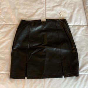 Leather skirt with 2 thigh slits. Size small, brand Mangopop